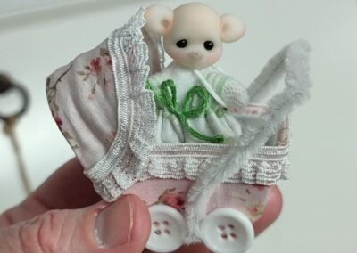 Muñeca osito con cochecito