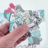 Elementos navideños para muñeca de papel de Evaninas.