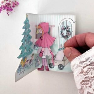 Postal de Navidad con muñeca de papel hecha por Evaninas.